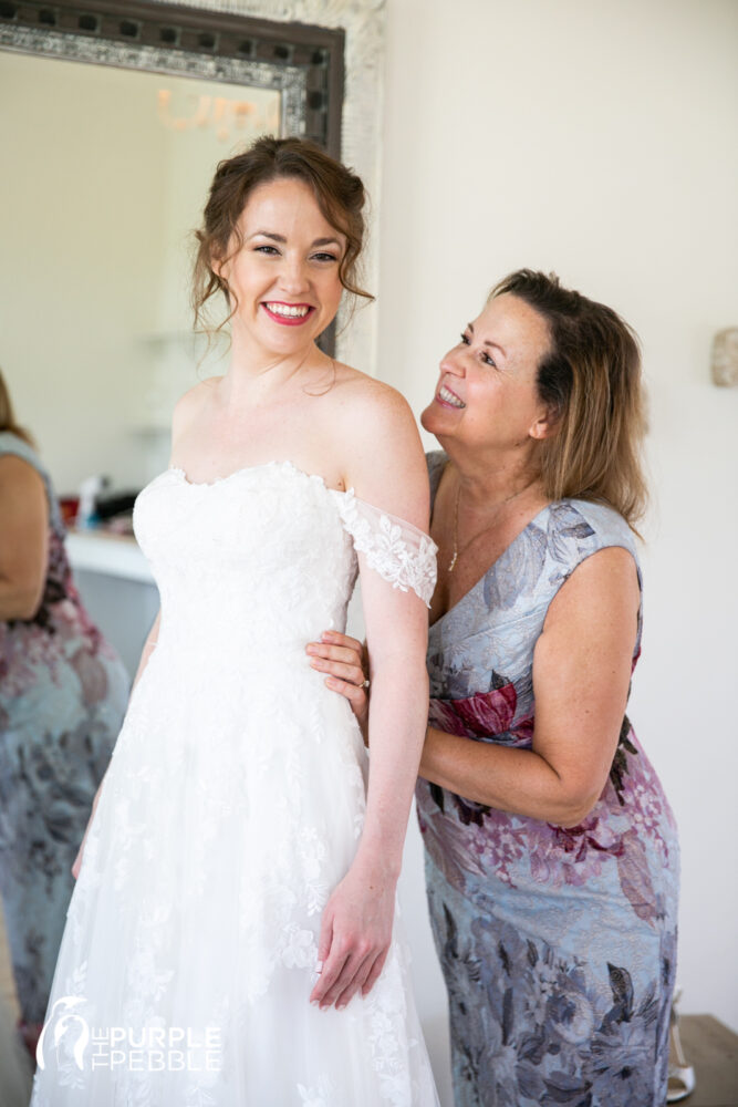 Mom Helping Bride Getting Ready