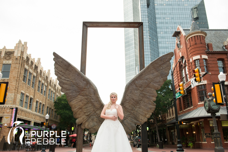 bridal portrait wings of the city