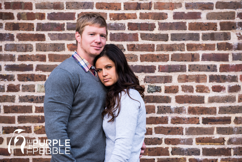 brick wall couple engagement photos